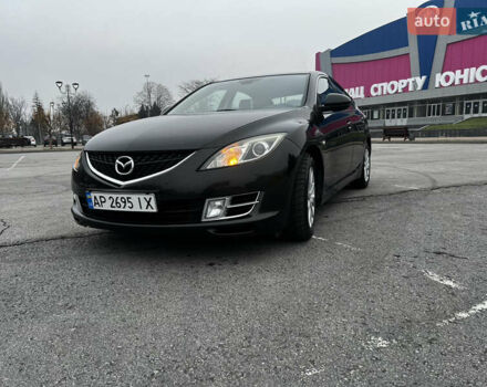 Серый Мазда 6, объемом двигателя 2 л и пробегом 305 тыс. км за 6300 $, фото 1 на Automoto.ua