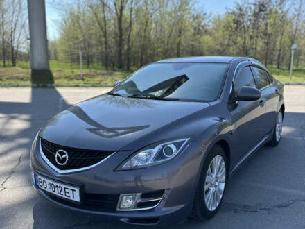 Серый Мазда 6, объемом двигателя 2 л и пробегом 230 тыс. км за 6700 $, фото 1 на Automoto.ua
