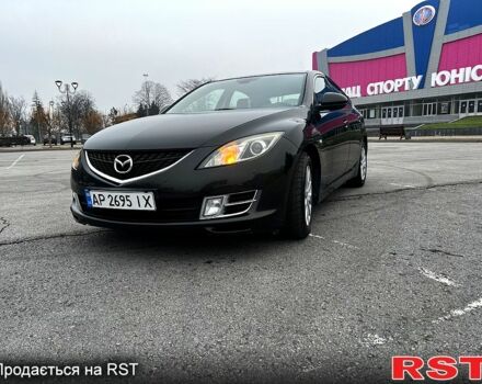 Серый Мазда 6, объемом двигателя 2 л и пробегом 305 тыс. км за 6300 $, фото 1 на Automoto.ua