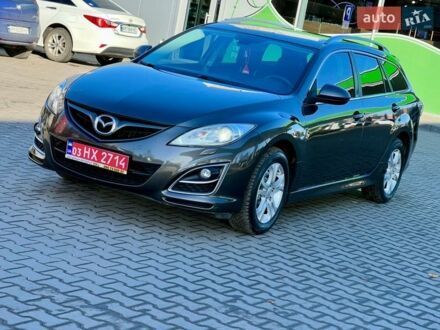 Серый Мазда 6, объемом двигателя 2.49 л и пробегом 248 тыс. км за 8999 $, фото 1 на Automoto.ua