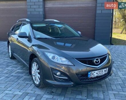 Серый Мазда 6, объемом двигателя 2.2 л и пробегом 245 тыс. км за 7000 $, фото 1 на Automoto.ua