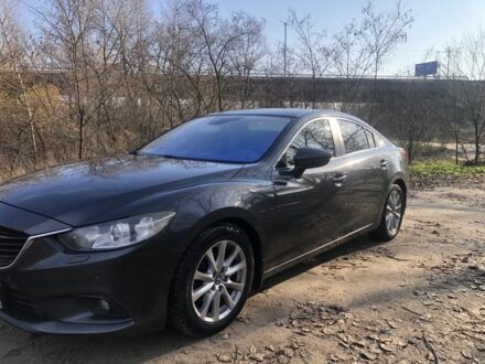 Серый Мазда 6, объемом двигателя 2 л и пробегом 255 тыс. км за 10500 $, фото 1 на Automoto.ua