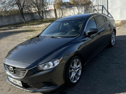 Серый Мазда 6, объемом двигателя 2.5 л и пробегом 235 тыс. км за 11000 $, фото 1 на Automoto.ua