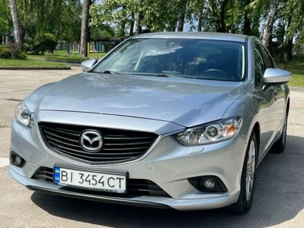 Серый Мазда 6, объемом двигателя 2 л и пробегом 139 тыс. км за 12500 $, фото 1 на Automoto.ua