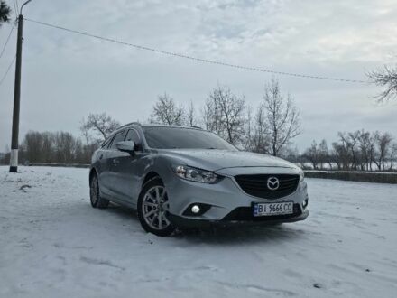 Серый Мазда 6, объемом двигателя 2.2 л и пробегом 273 тыс. км за 13000 $, фото 1 на Automoto.ua
