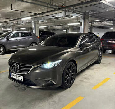 Серый Мазда 6, объемом двигателя 2.49 л и пробегом 229 тыс. км за 13300 $, фото 1 на Automoto.ua