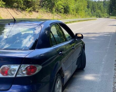 Синий Мазда 6, объемом двигателя 2 л и пробегом 250 тыс. км за 2299 $, фото 5 на Automoto.ua