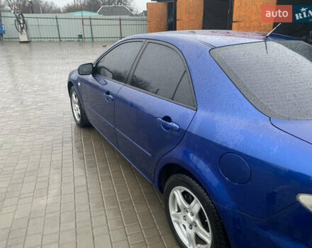 Синій Мазда 6, об'ємом двигуна 2.3 л та пробігом 257 тис. км за 5500 $, фото 6 на Automoto.ua