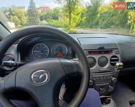Синий Мазда 6, объемом двигателя 2 л и пробегом 304 тыс. км за 2058 $, фото 23 на Automoto.ua