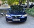 Синий Мазда 6, объемом двигателя 1.8 л и пробегом 185 тыс. км за 1750 $, фото 1 на Automoto.ua