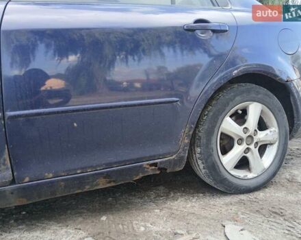 Синий Мазда 6, объемом двигателя 2 л и пробегом 304 тыс. км за 2058 $, фото 5 на Automoto.ua