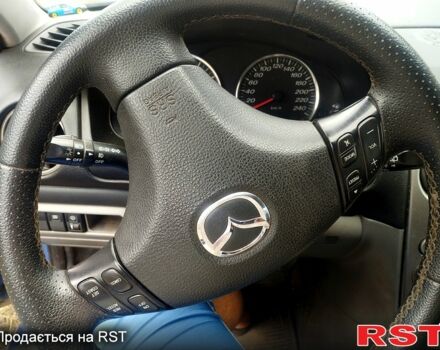 Синий Мазда 6, объемом двигателя 2 л и пробегом 350 тыс. км за 3000 $, фото 4 на Automoto.ua