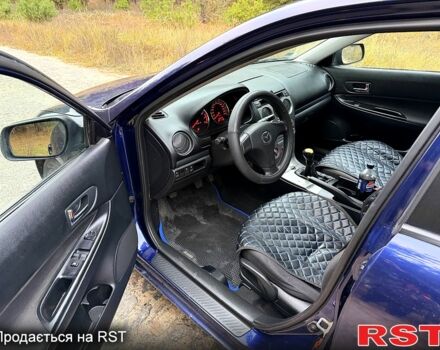 Синій Мазда 6, об'ємом двигуна 2 л та пробігом 247 тис. км за 3950 $, фото 9 на Automoto.ua