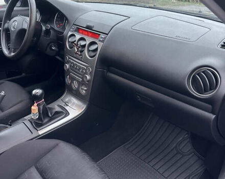 Синий Мазда 6, объемом двигателя 1.8 л и пробегом 168 тыс. км за 4800 $, фото 21 на Automoto.ua