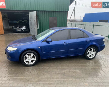 Синій Мазда 6, об'ємом двигуна 2.3 л та пробігом 257 тис. км за 5500 $, фото 3 на Automoto.ua