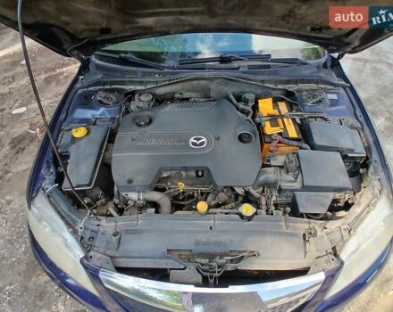 Синий Мазда 6, объемом двигателя 2 л и пробегом 304 тыс. км за 2058 $, фото 7 на Automoto.ua