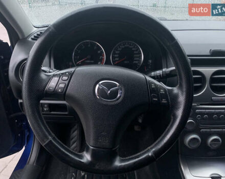 Синій Мазда 6, об'ємом двигуна 2.3 л та пробігом 257 тис. км за 5500 $, фото 15 на Automoto.ua