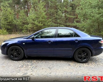 Синій Мазда 6, об'ємом двигуна 2 л та пробігом 247 тис. км за 3950 $, фото 4 на Automoto.ua