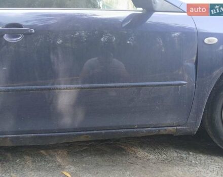 Синий Мазда 6, объемом двигателя 2 л и пробегом 304 тыс. км за 2058 $, фото 13 на Automoto.ua