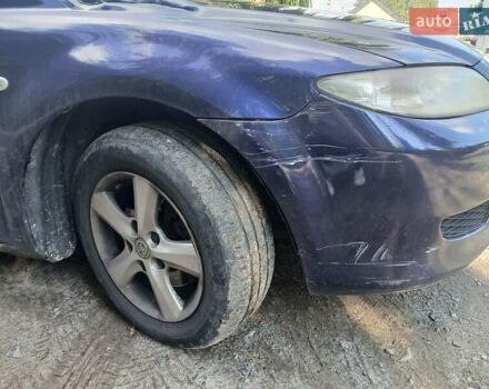 Синий Мазда 6, объемом двигателя 2 л и пробегом 304 тыс. км за 2058 $, фото 12 на Automoto.ua