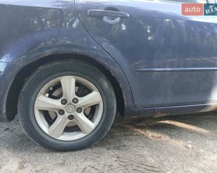 Синий Мазда 6, объемом двигателя 2 л и пробегом 304 тыс. км за 2058 $, фото 11 на Automoto.ua