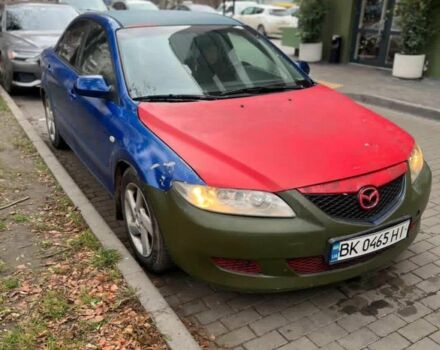 Синий Мазда 6, объемом двигателя 2 л и пробегом 450 тыс. км за 2000 $, фото 1 на Automoto.ua
