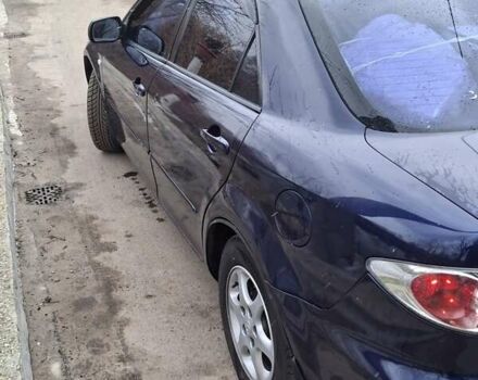 Синий Мазда 6, объемом двигателя 1.8 л и пробегом 330 тыс. км за 4700 $, фото 1 на Automoto.ua