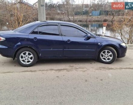 Синий Мазда 6, объемом двигателя 1.8 л и пробегом 330 тыс. км за 4700 $, фото 5 на Automoto.ua