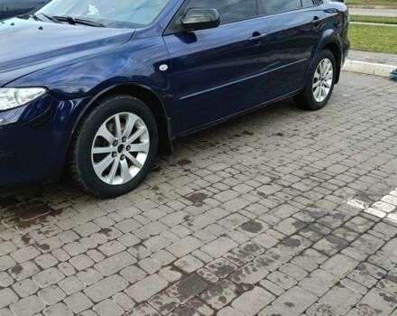 Синий Мазда 6, объемом двигателя 2 л и пробегом 305 тыс. км за 4720 $, фото 1 на Automoto.ua