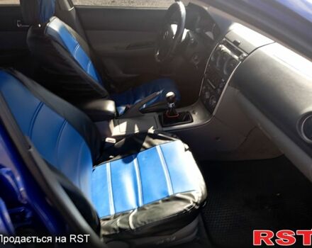 Синий Мазда 6, объемом двигателя 2.3 л и пробегом 269 тыс. км за 3000 $, фото 2 на Automoto.ua