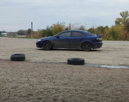 Синий Мазда 6, объемом двигателя 2 л и пробегом 300 тыс. км за 3000 $, фото 2 на Automoto.ua