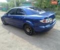 Синий Мазда 6, объемом двигателя 2 л и пробегом 300 тыс. км за 2999 $, фото 3 на Automoto.ua