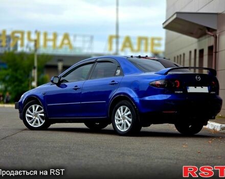 Синий Мазда 6, объемом двигателя 2 л и пробегом 307 тыс. км за 5500 $, фото 1 на Automoto.ua