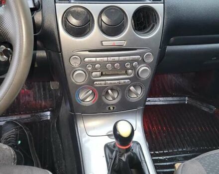Синий Мазда 6, объемом двигателя 2 л и пробегом 320 тыс. км за 3600 $, фото 2 на Automoto.ua