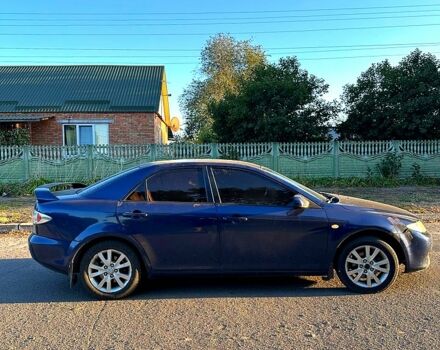 Синий Мазда 6, объемом двигателя 2.3 л и пробегом 270 тыс. км за 3350 $, фото 1 на Automoto.ua