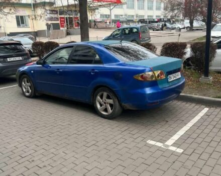 Синий Мазда 6, объемом двигателя 2 л и пробегом 450 тыс. км за 2000 $, фото 2 на Automoto.ua