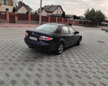 Синий Мазда 6, объемом двигателя 2 л и пробегом 340 тыс. км за 1850 $, фото 4 на Automoto.ua