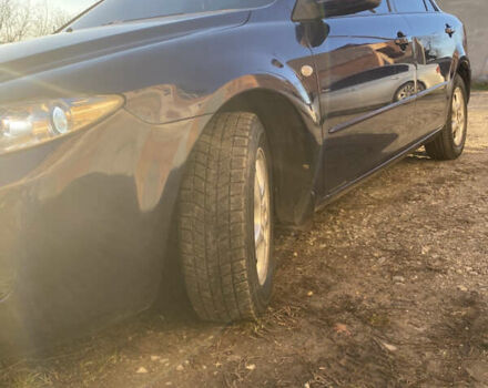 Синий Мазда 6, объемом двигателя 1.8 л и пробегом 321 тыс. км за 3950 $, фото 3 на Automoto.ua