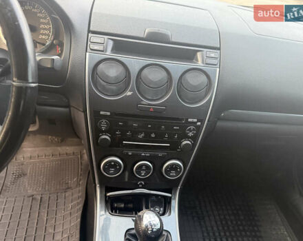 Синий Мазда 6, объемом двигателя 1.8 л и пробегом 355 тыс. км за 4500 $, фото 7 на Automoto.ua