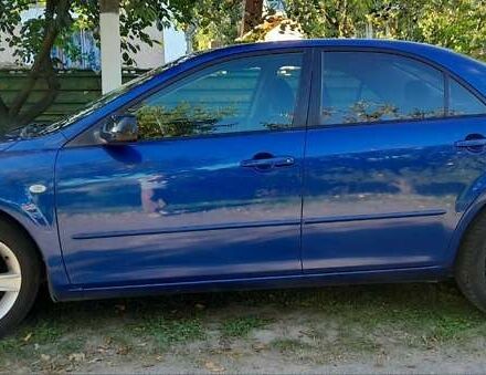 Синий Мазда 6, объемом двигателя 1.8 л и пробегом 185 тыс. км за 5395 $, фото 32 на Automoto.ua