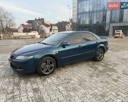 Синий Мазда 6, объемом двигателя 1.8 л и пробегом 355 тыс. км за 4500 $, фото 1 на Automoto.ua