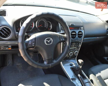 Синий Мазда 6, объемом двигателя 1.8 л и пробегом 170 тыс. км за 5300 $, фото 6 на Automoto.ua