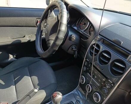 Синий Мазда 6, объемом двигателя 1.8 л и пробегом 170 тыс. км за 5500 $, фото 39 на Automoto.ua