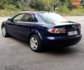 Синий Мазда 6, объемом двигателя 2 л и пробегом 217 тыс. км за 4399 $, фото 2 на Automoto.ua