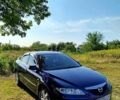 Синій Мазда 6, об'ємом двигуна 2 л та пробігом 295 тис. км за 4500 $, фото 1 на Automoto.ua