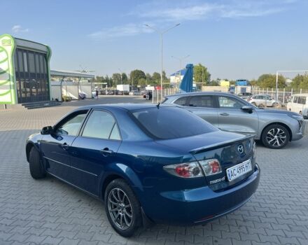 Синий Мазда 6, объемом двигателя 2 л и пробегом 256 тыс. км за 4000 $, фото 1 на Automoto.ua