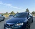 Синий Мазда 6, объемом двигателя 2 л и пробегом 256 тыс. км за 4000 $, фото 1 на Automoto.ua
