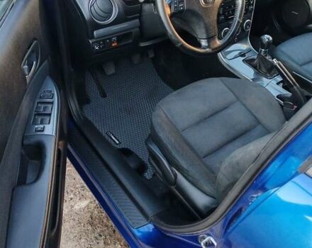 Синий Мазда 6, объемом двигателя 2 л и пробегом 320 тыс. км за 4400 $, фото 4 на Automoto.ua