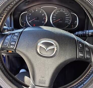 Синій Мазда 6, об'ємом двигуна 1.8 л та пробігом 248 тис. км за 4200 $, фото 5 на Automoto.ua