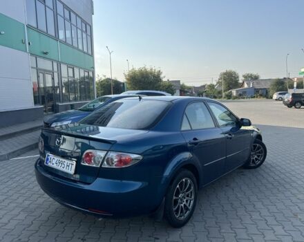 Синий Мазда 6, объемом двигателя 2 л и пробегом 256 тыс. км за 4000 $, фото 2 на Automoto.ua